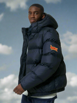 Dready Script Badge Oversized Puffa Jacket, Puff Puff Give Collection