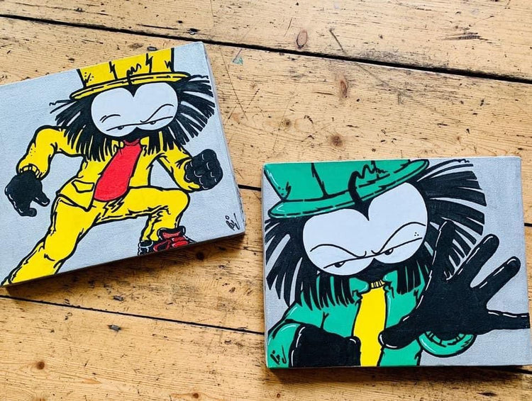 Painted Dready character blocks on wood