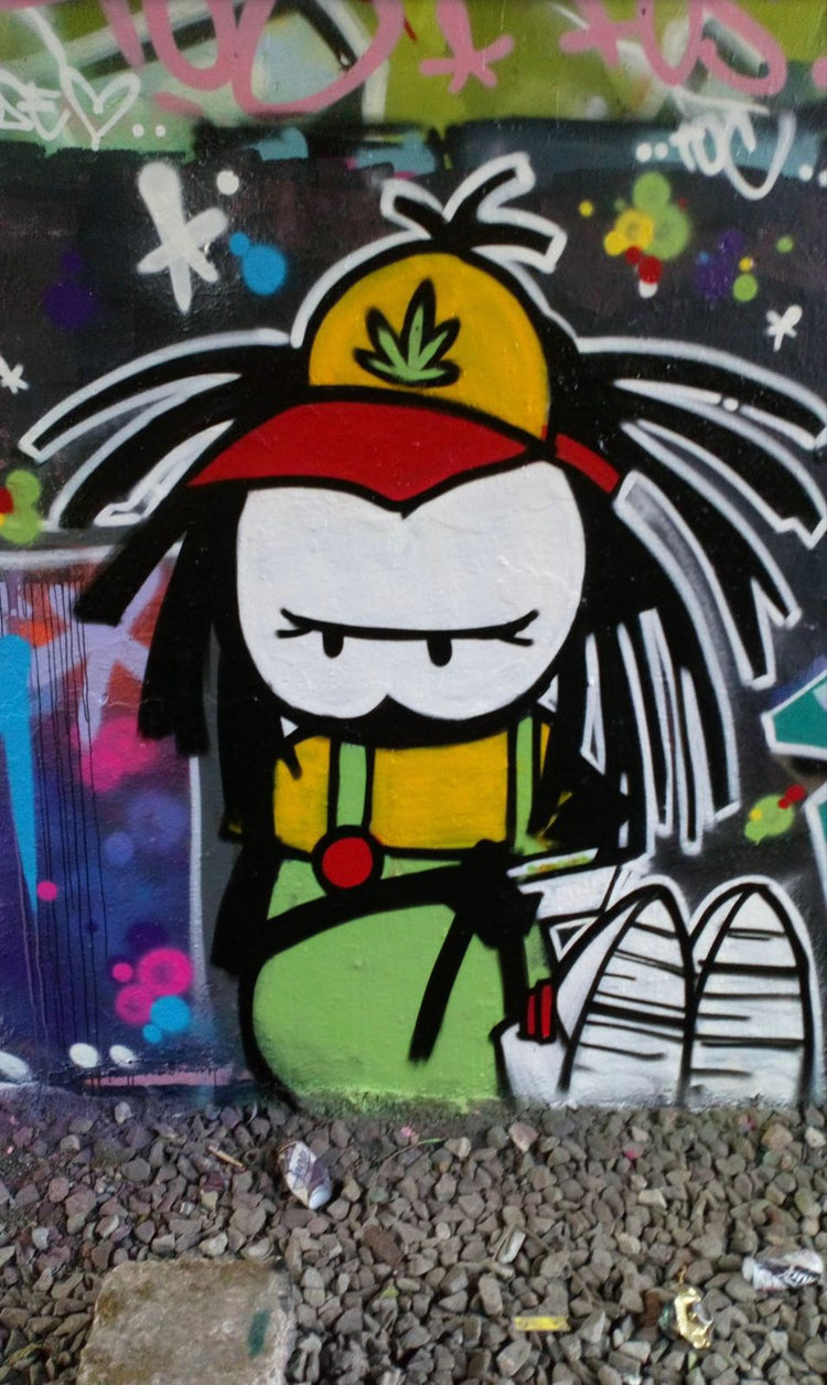 Tall Dready character mural in Rasta colours